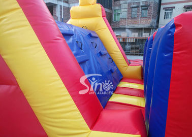 37' long outdoor commercial kids inflatable obstacle course with pillars and slides inside