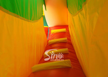 Custom made outdoor tropical inflatable combo castle with slide made of lead free pvc tarpaulin