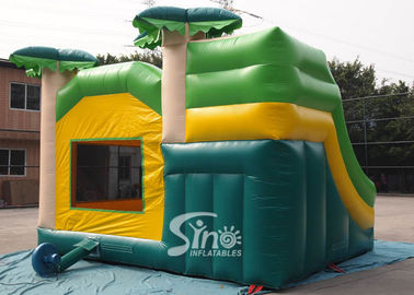 Custom made outdoor tropical inflatable combo castle with slide made of lead free pvc tarpaulin